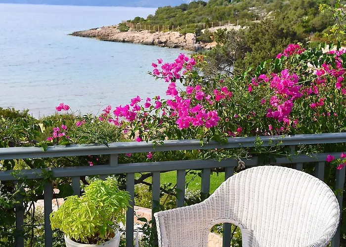 Iris - Luxury Traditional Beachfront With Swimming Pool Villa