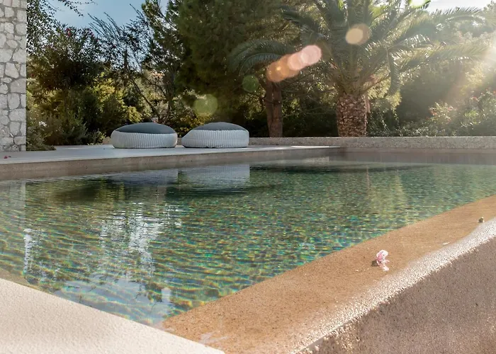 Iris - Luxury Traditional Beachfront With Swimming Pool Villa